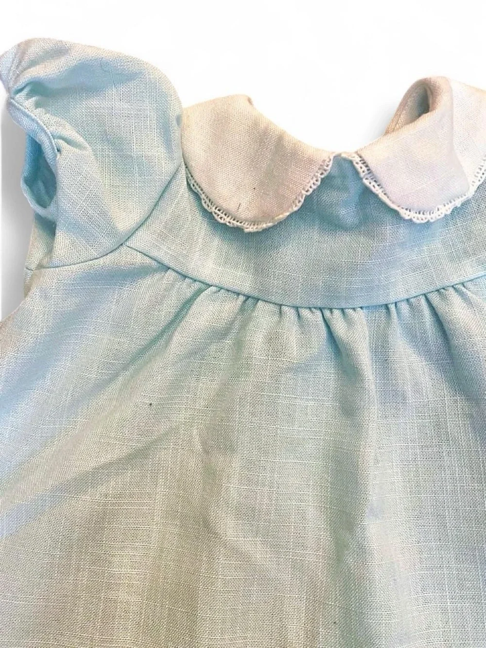Handmade Baby blue baby dress with white lace collar and pink rose appliqués